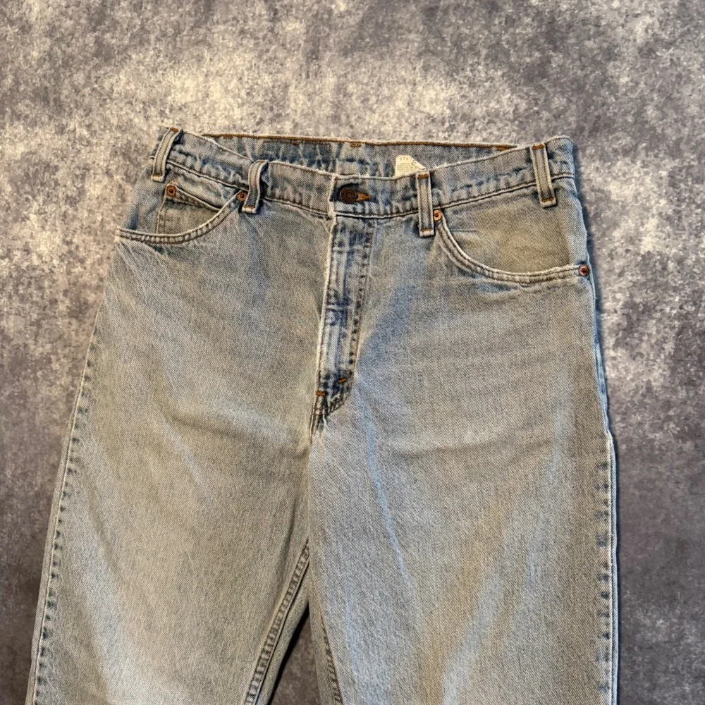 VTG Levis 550 Orange Tab Relaxed Fit Tapered Leg Jeans 33x32 Light Wash Made USA
